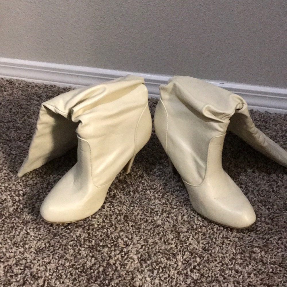 Knee high heeled boots